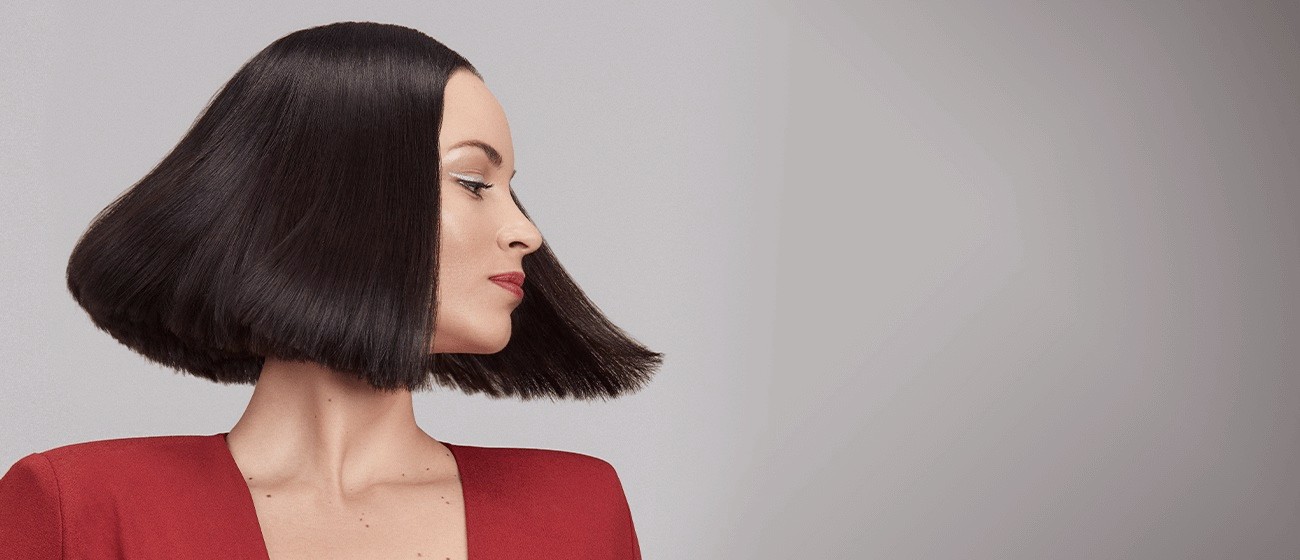 Femme au carré brun en mouvement - Wella